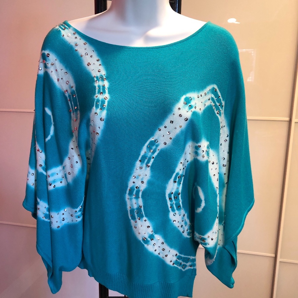 teal blue and white sweater